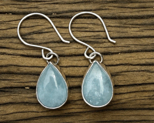 Blue teardrop shaped aquamarine drop earrings in sterling silver